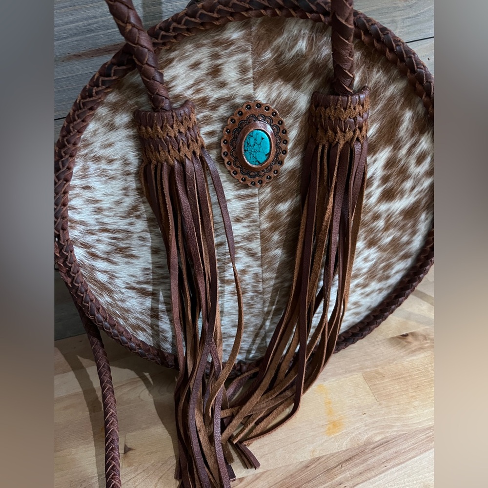 American Darling round cow hide & leather bag.